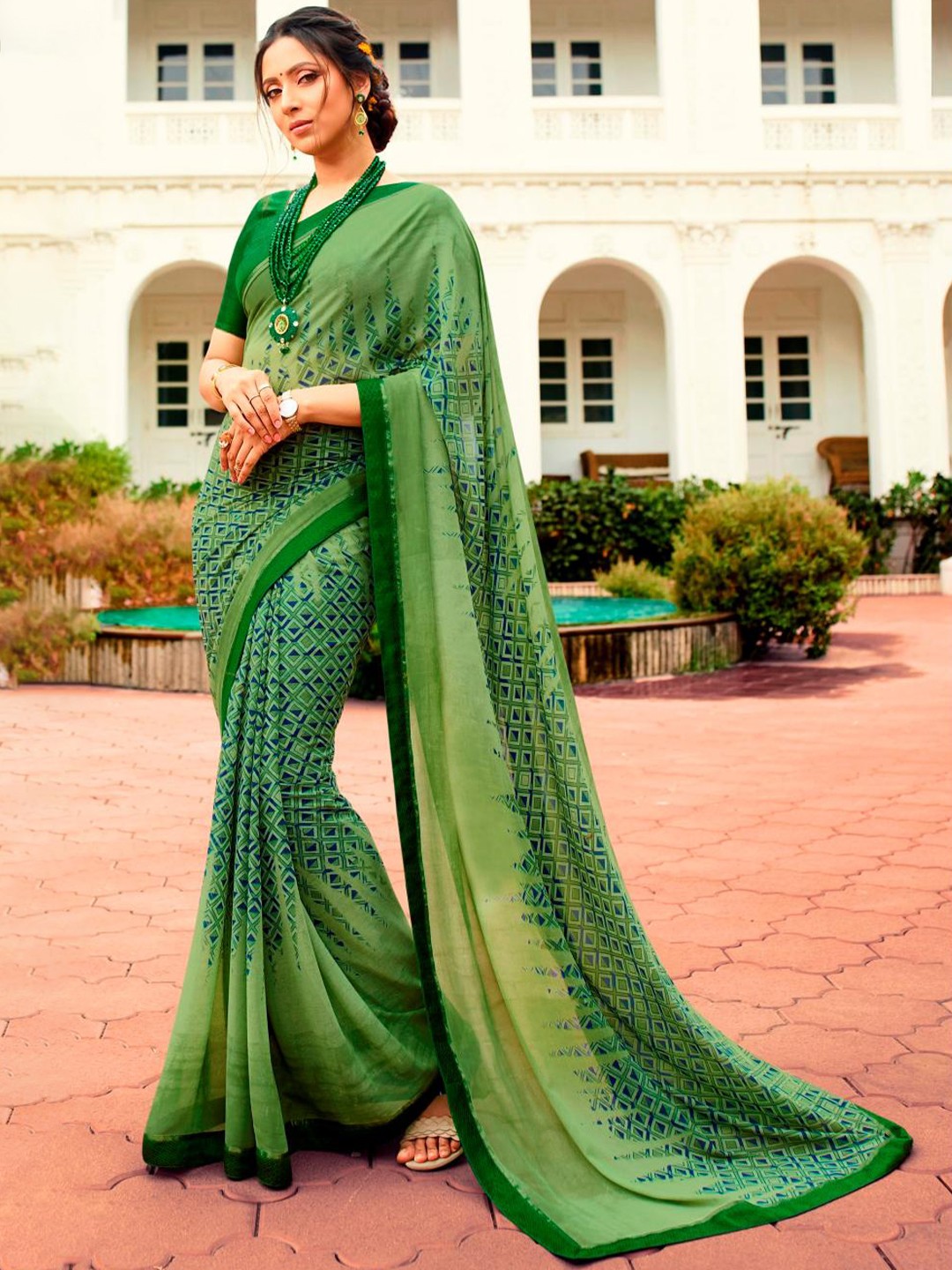 

Civamee Floral Poly Georgette Designer Saree, Green