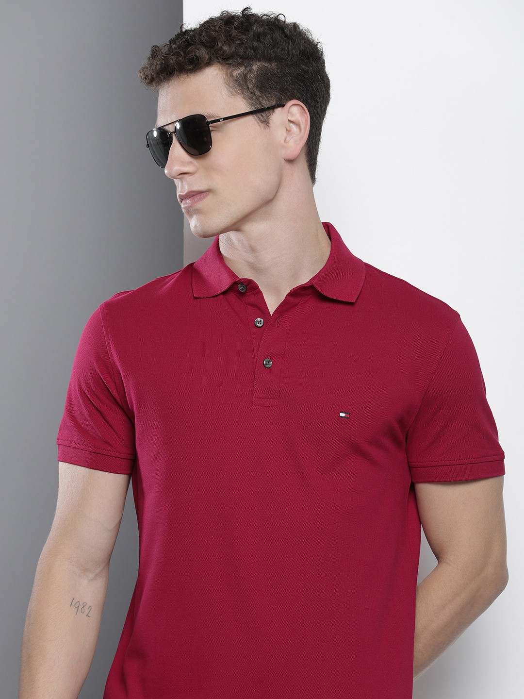 

Tommy Hilfiger Solid Slim Fit Short Sleeves Polo Collar T-shirt, Magenta