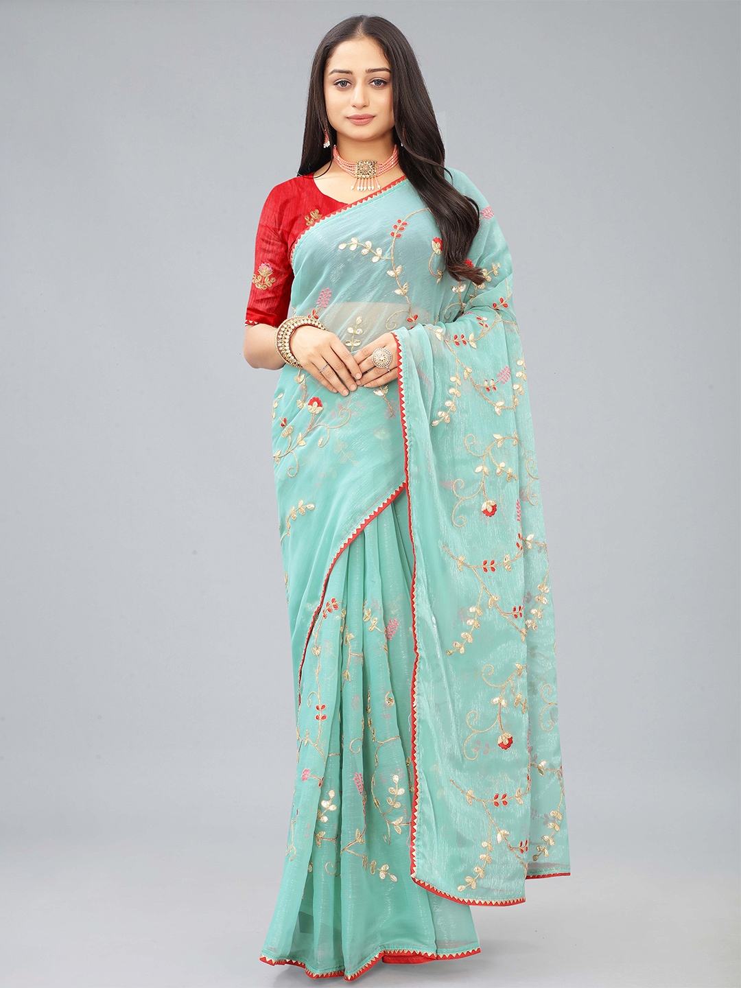 

Kiwie Blue Embroidered Heavy Work Saree