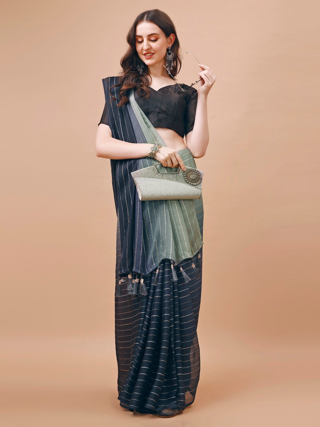 

Mitera Navy Blue Striped Zari Pure Chiffon Saree