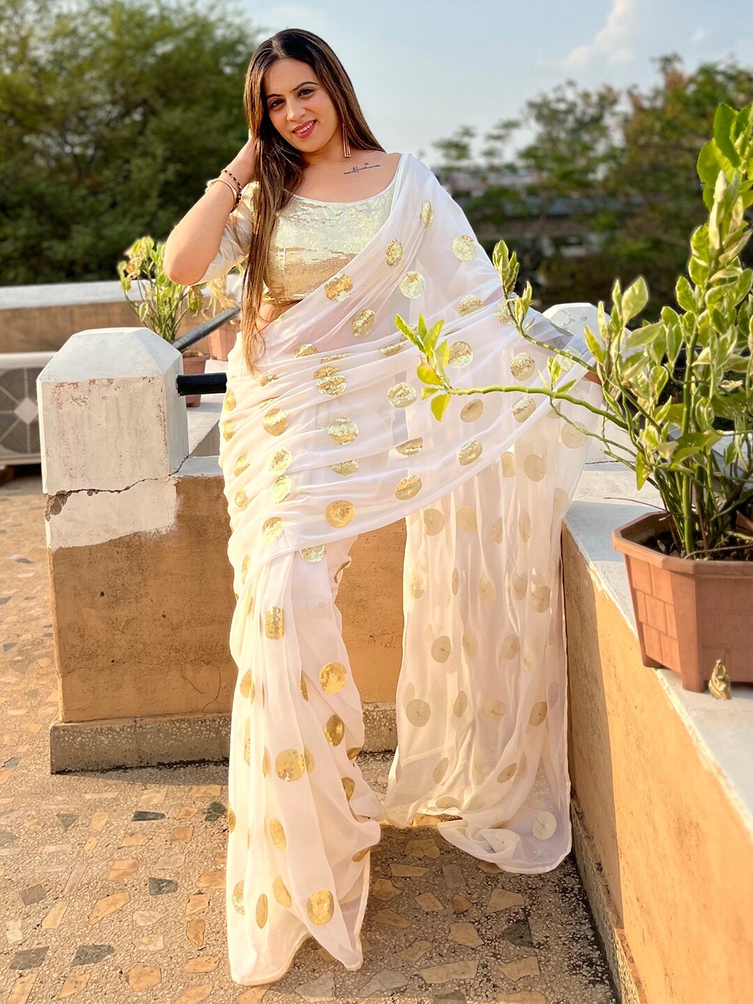 

Anouk White & Gold-Toned Embellished Sequinned Pure Georgette Saree