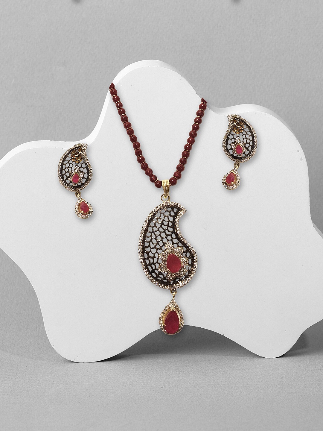

Adwitiya Collection Gold-Plated Stones Studded Antique Jewellery Set