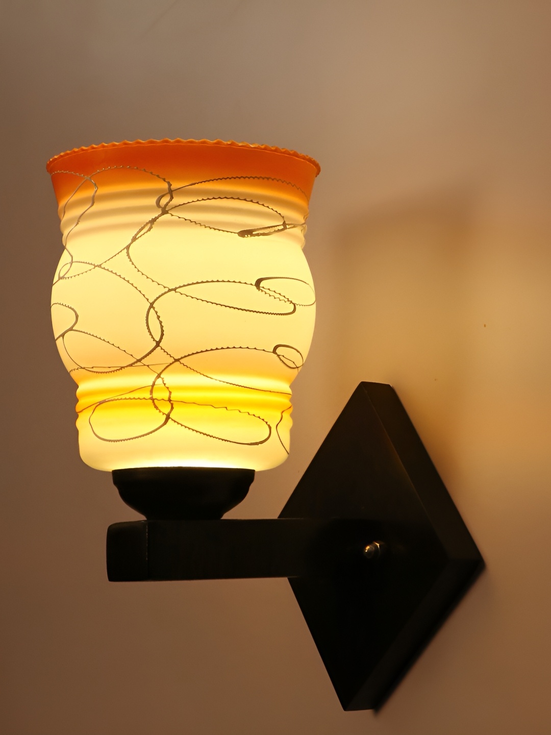 

Afast Orange & Black Printed Abstract Shaped Glass Wall Lamp