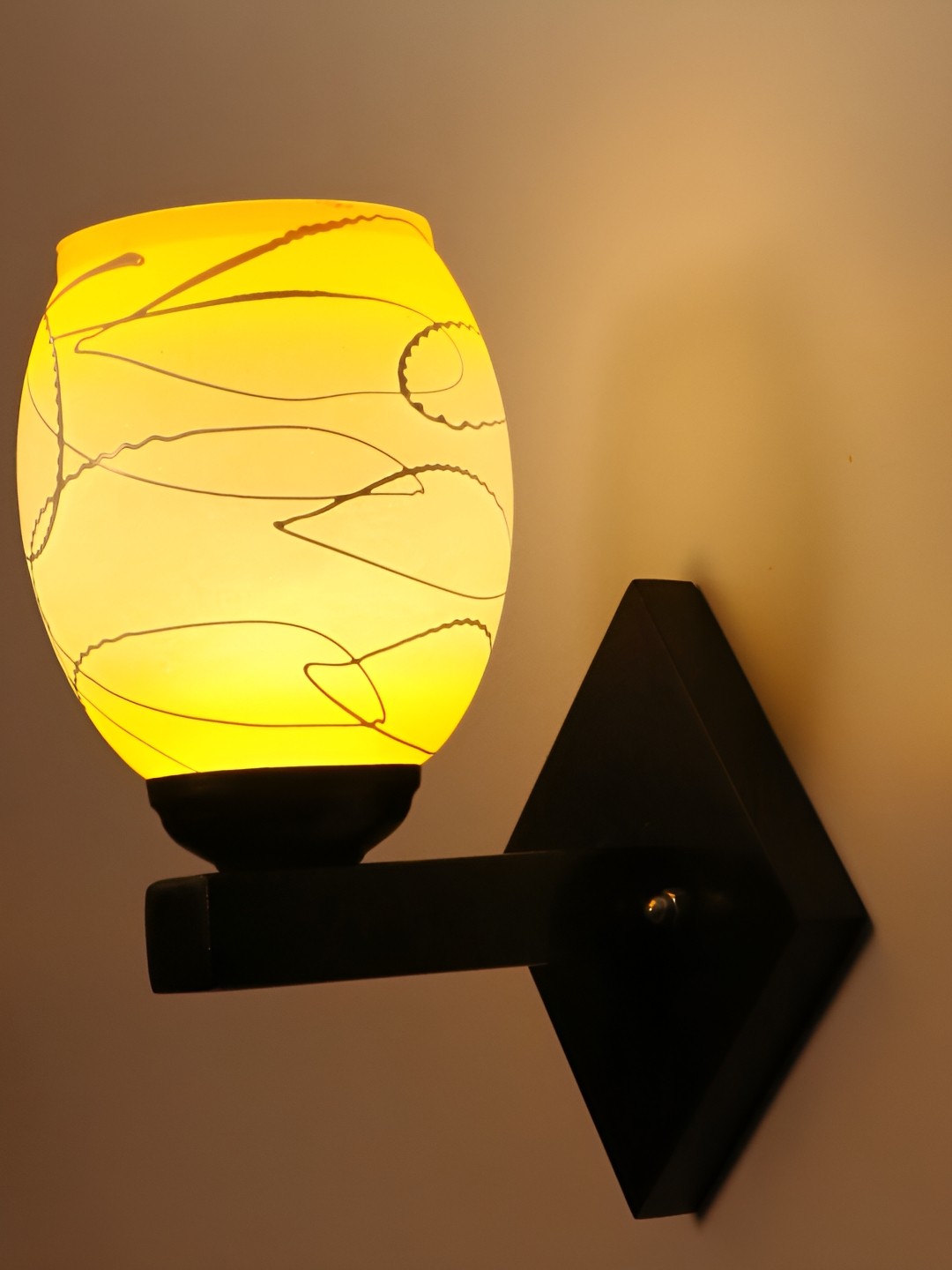 

Afast Yellow & Black Printed Abstract Shaped Glass Wall Lamp