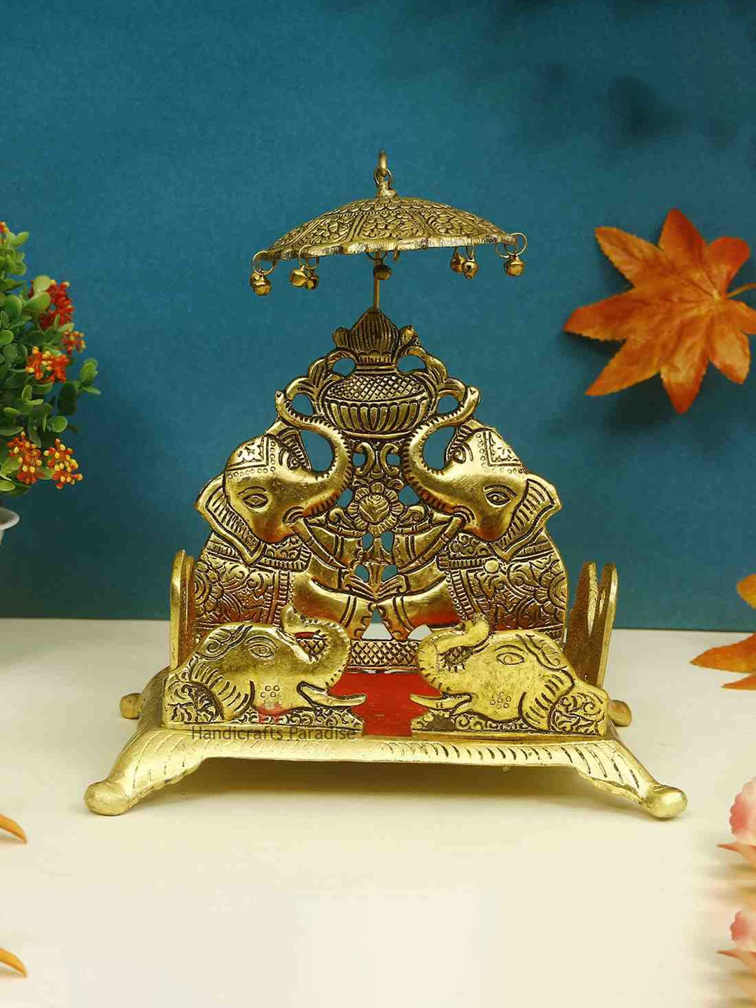 

HANDICRAFTS PARADISE Gold Toned & Red Pooja Singhasan With Umbrella