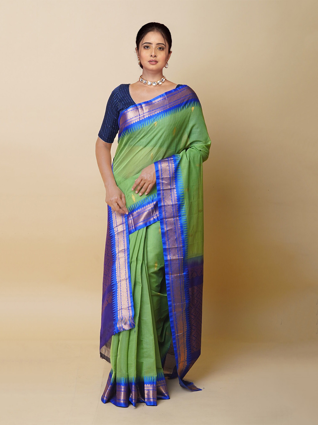 

Unnati Silks Ethnic Motifs Woven Design Zari Pure Cotton Gadwal Saree, Olive