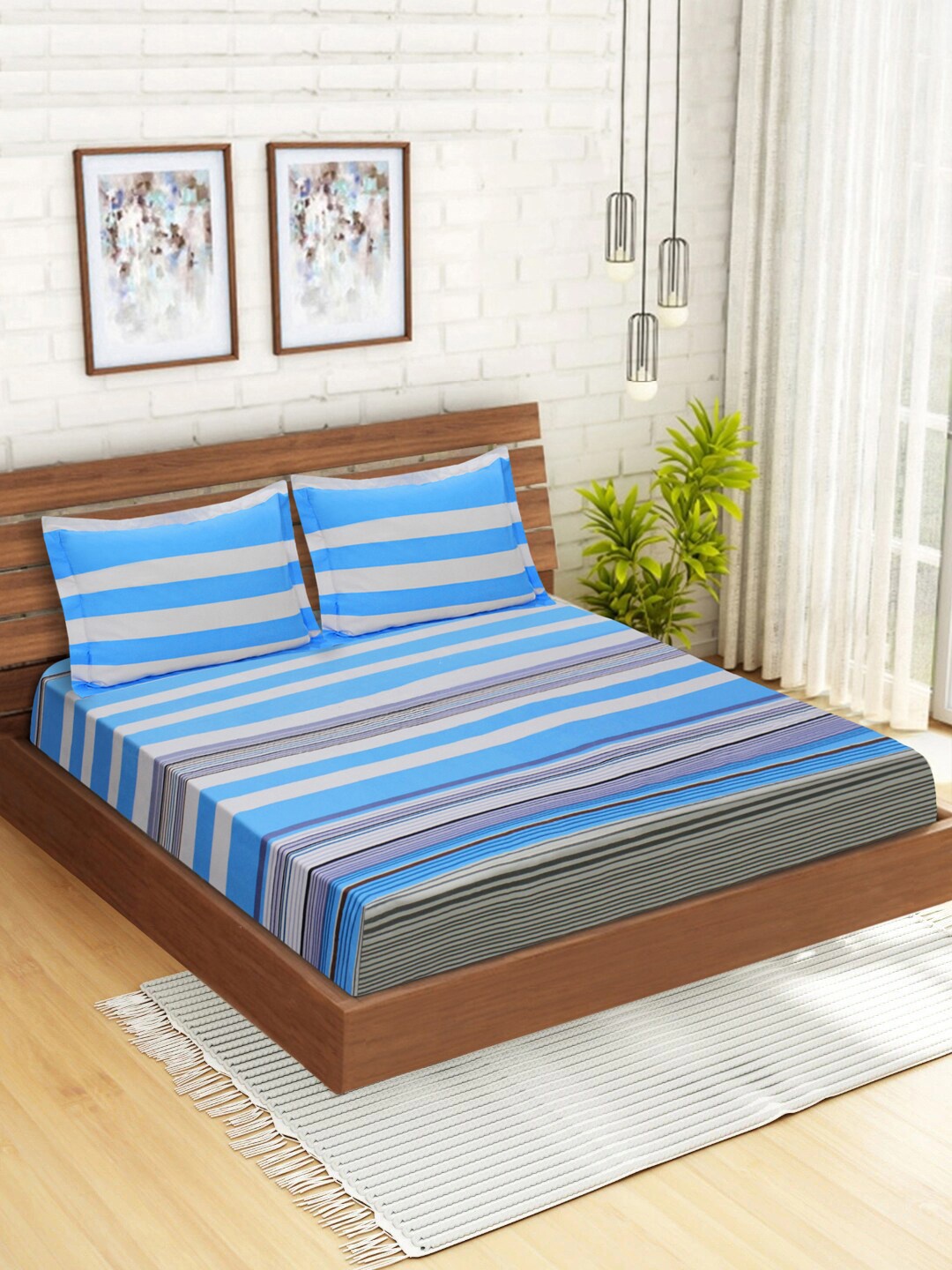 

Aura Blue & Beige Striped 152 TC Queen Bedsheet with 2 Pillow Covers