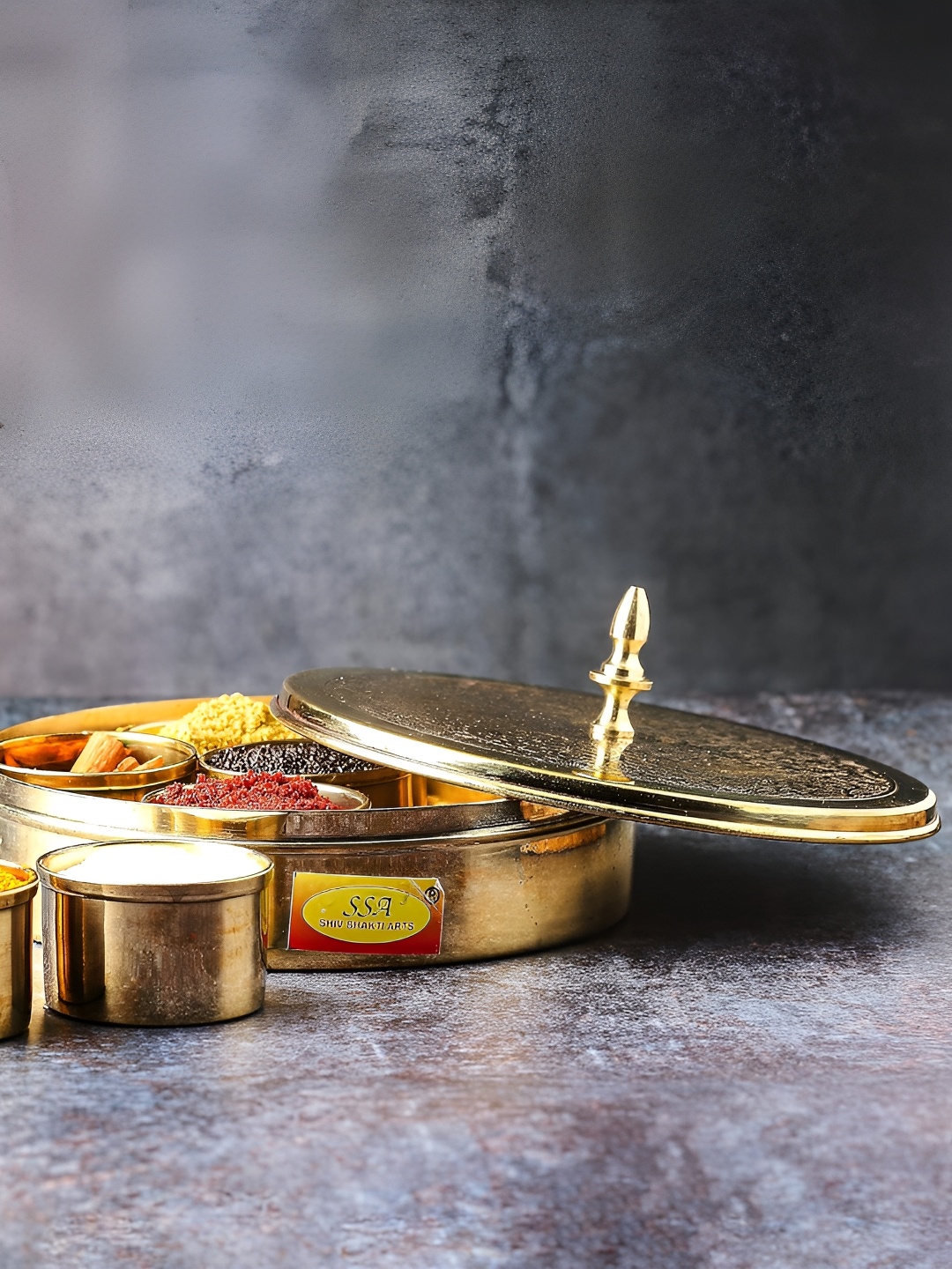 Shivshakti Arts Copper Toned Brass Spice Box With Spoon