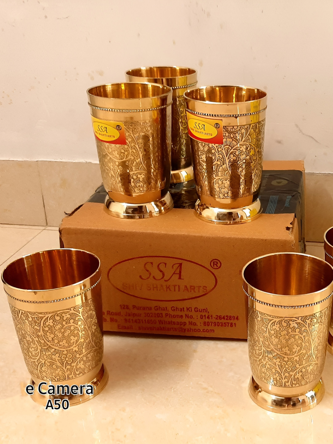 

Shivshakti Arts Yellow 6 Pieces Textured Brass Water Glasses 300 Ml, Gold