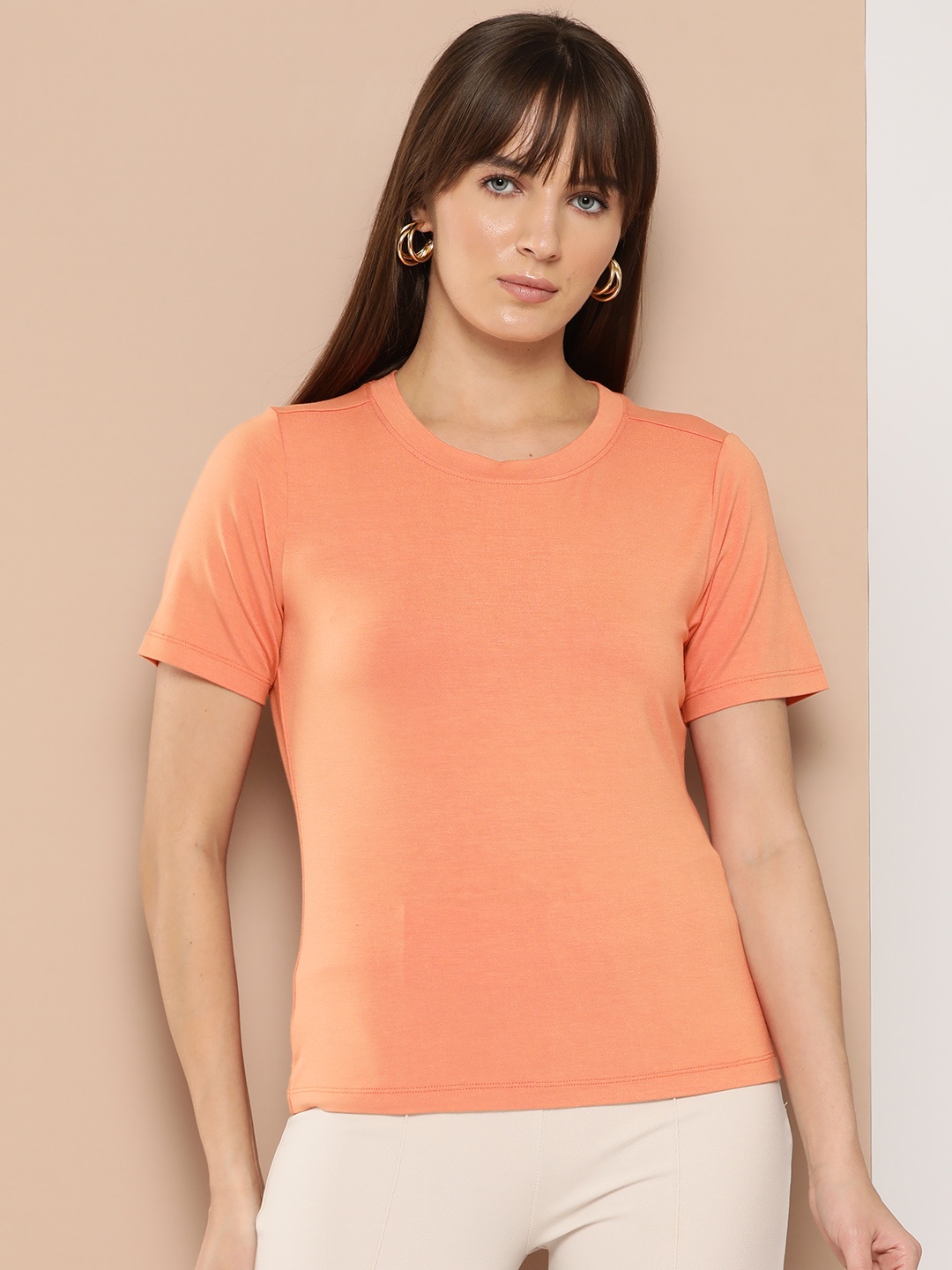 

Chemistry Women Solid Round Neck Half Sleeves T-shirt, Orange