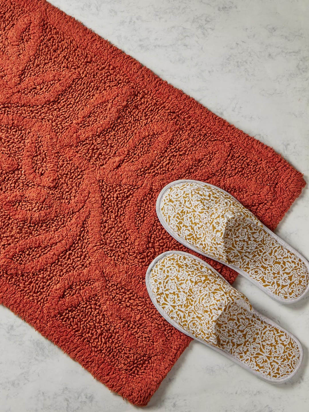 

Fabindia Aranya Red Woven 1902 GSM Pure Cotton Bath Rugs