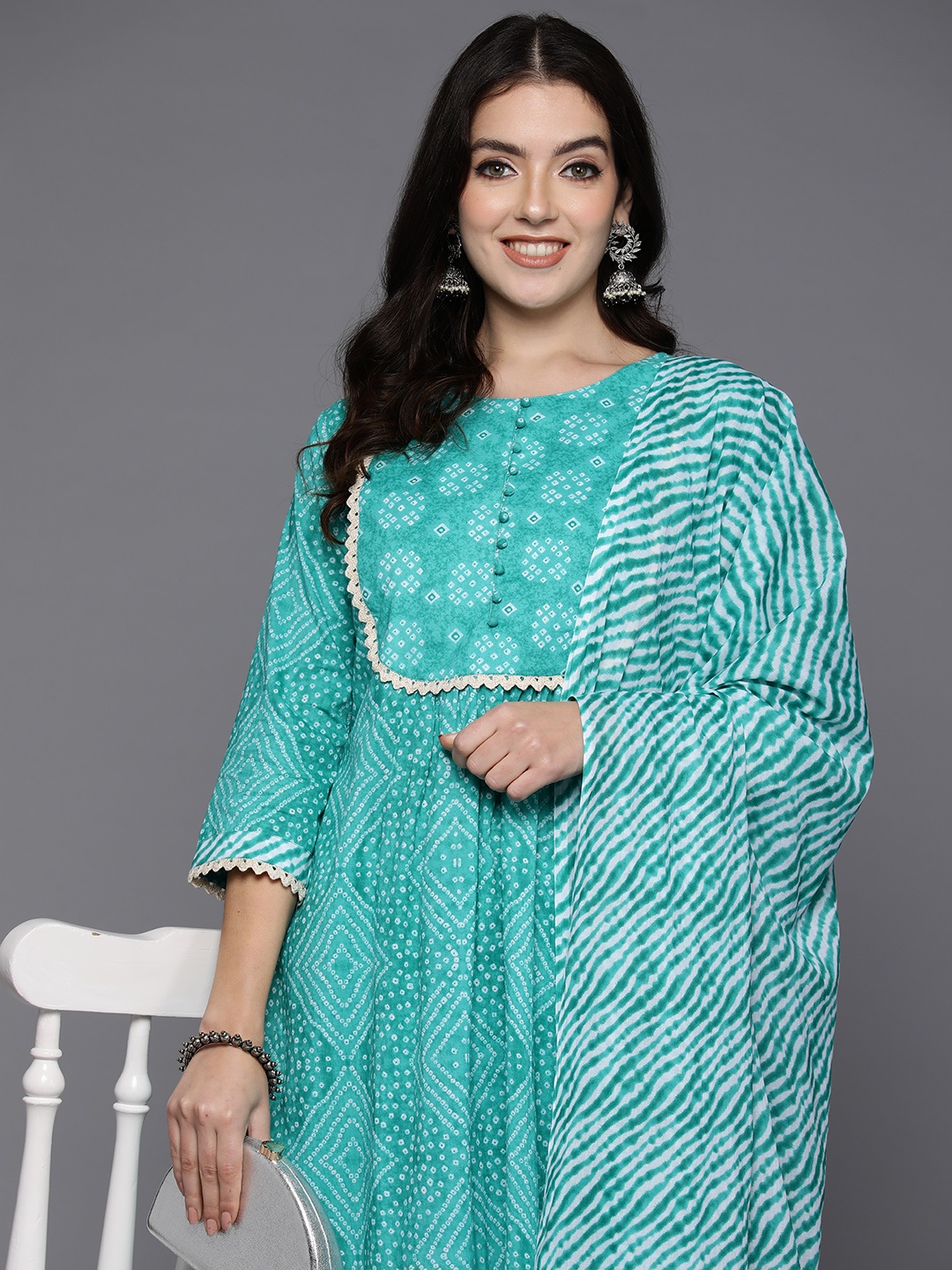 

Indo Era Women Bandhani Printed Regular Pure Cotton Kurta with Palazzos & Dupatta, Turquoise blue