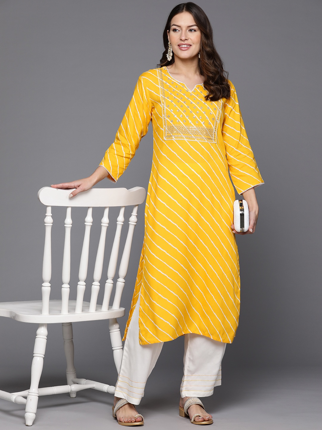 

Indo Era Women Leheriya Printed Sequinned Kurta, Yellow