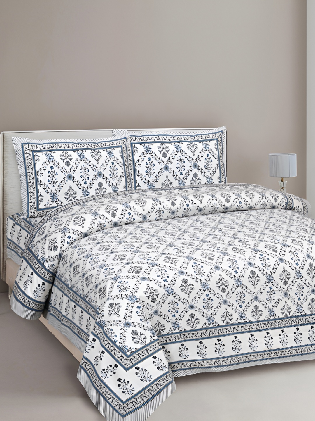 

Texstylers White & Blue Floral Printed Cotton 144 TC Queen Bedsheet With 2 Pillow Covers