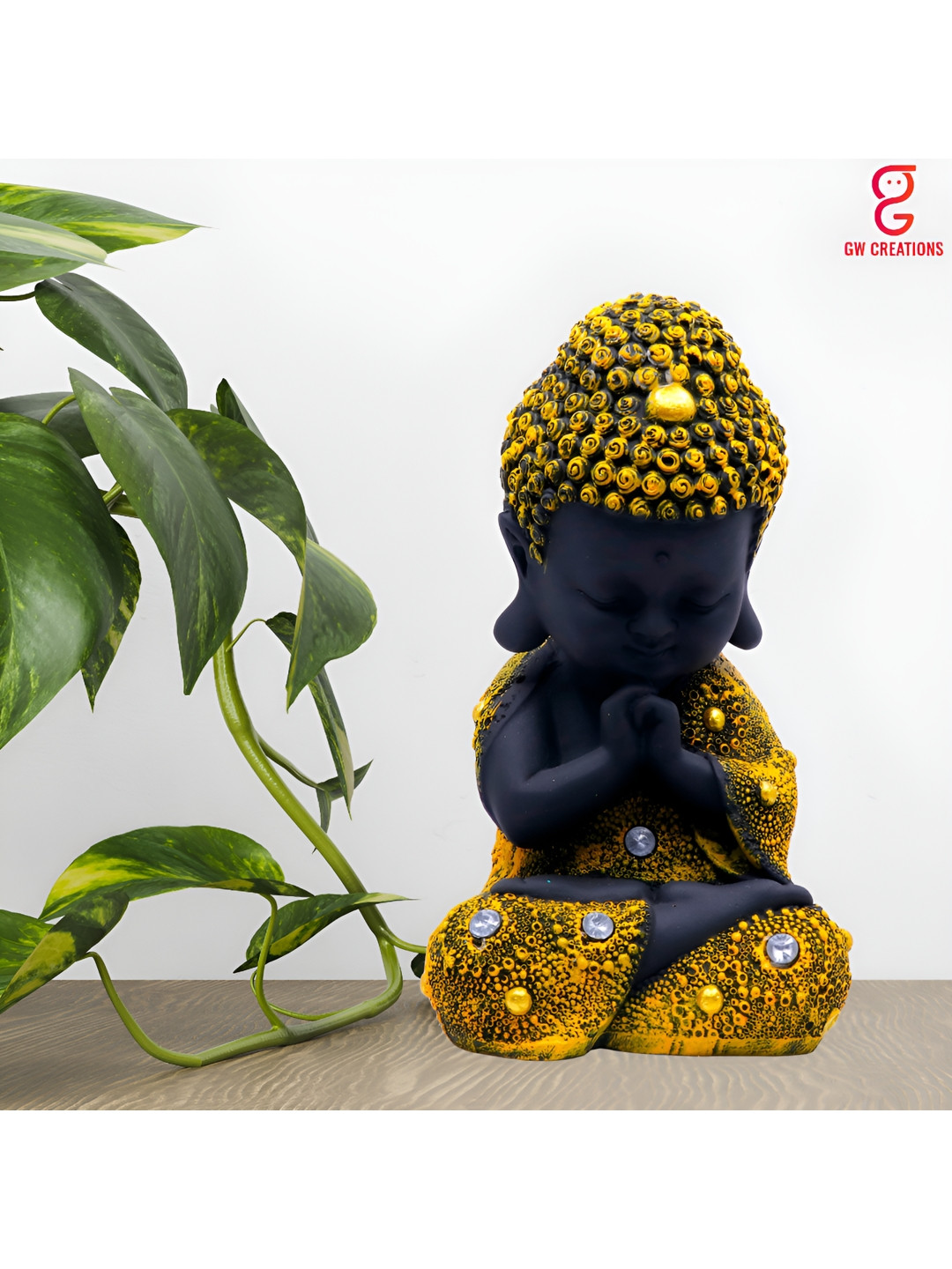 

GW CREATIONS Yellow & Black Buddha Idol Showpiece
