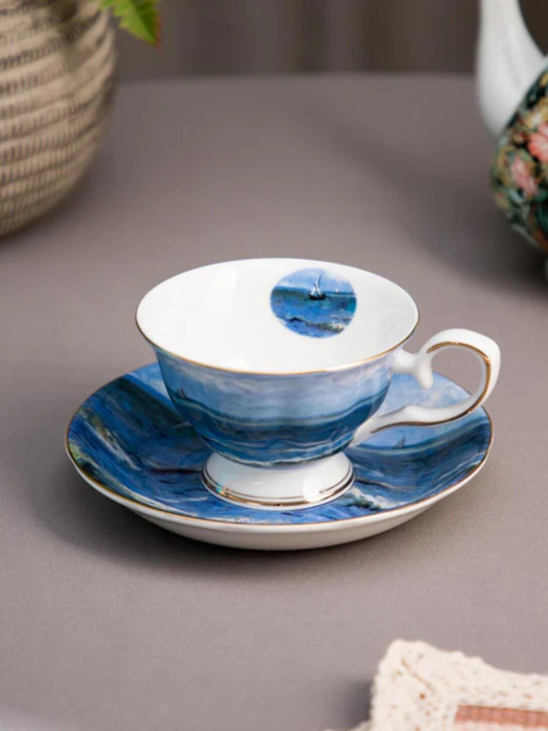 

THEDECORKART Blue & White 2 Pcs Floral Printed Ceramic Glossy Cup & Saucer 300 ML Each