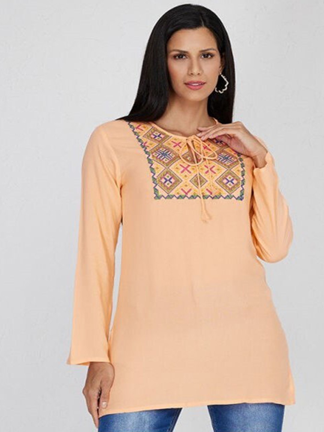

Aila Geometric Embroidered Tie-Up Neck Cotton Tunic, Peach