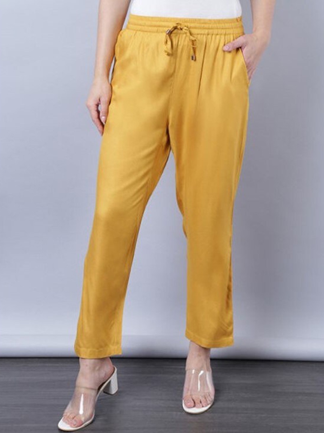 

Aila Women Regular Fir Mid-Rise Peg Trousers, Yellow