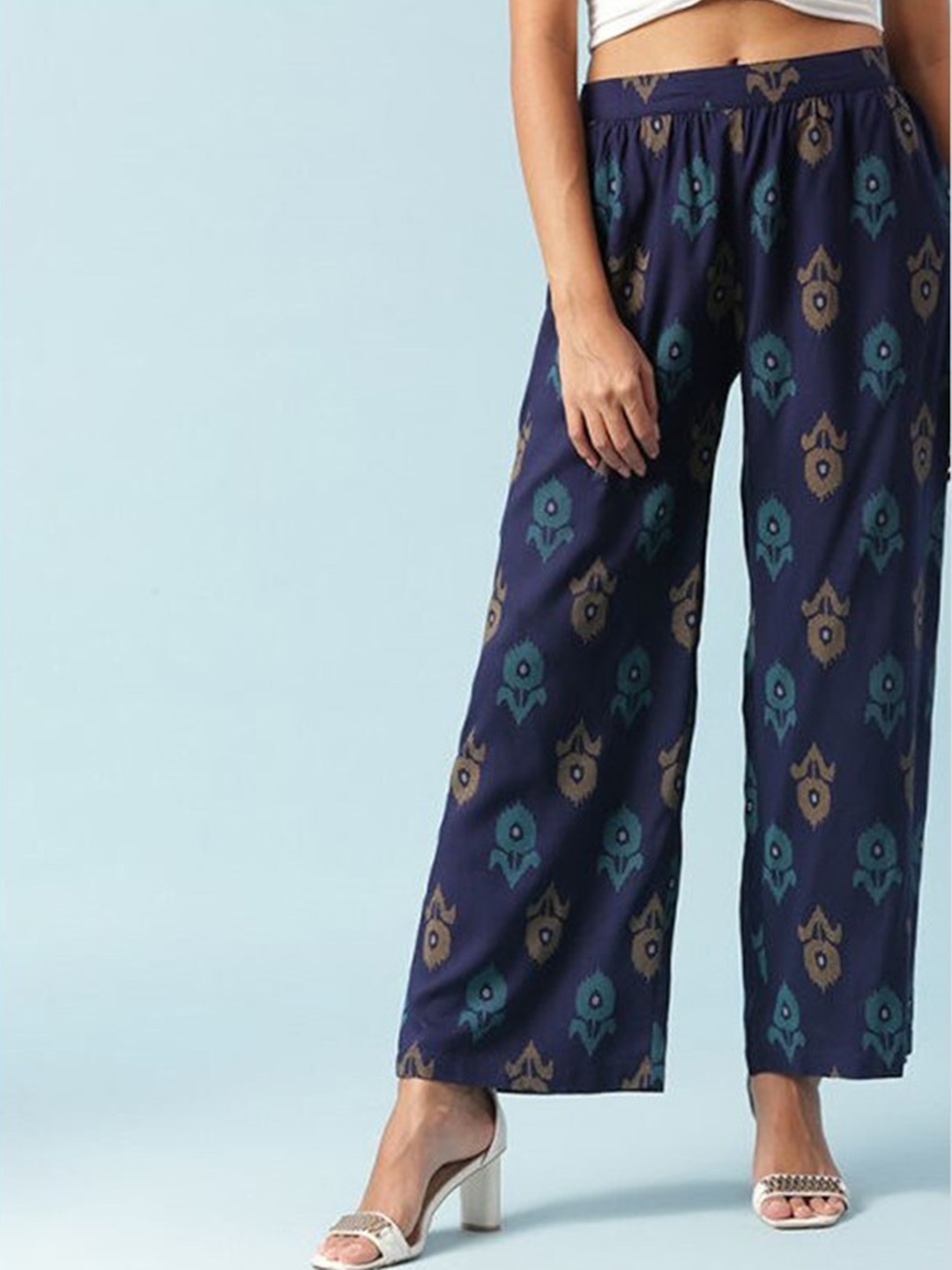 

Aila Women Ethnic Motifs Printed Loose Fit Pleated Trousers, Navy blue