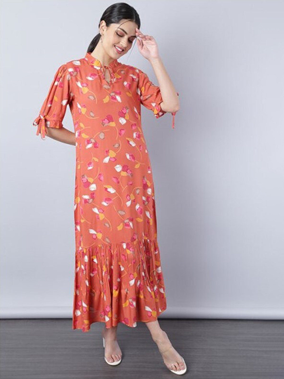 

Aila Floral Printed Tie-Up Neck Puff Sleeves Tiered Detail A-Line Maxi Dress, Peach