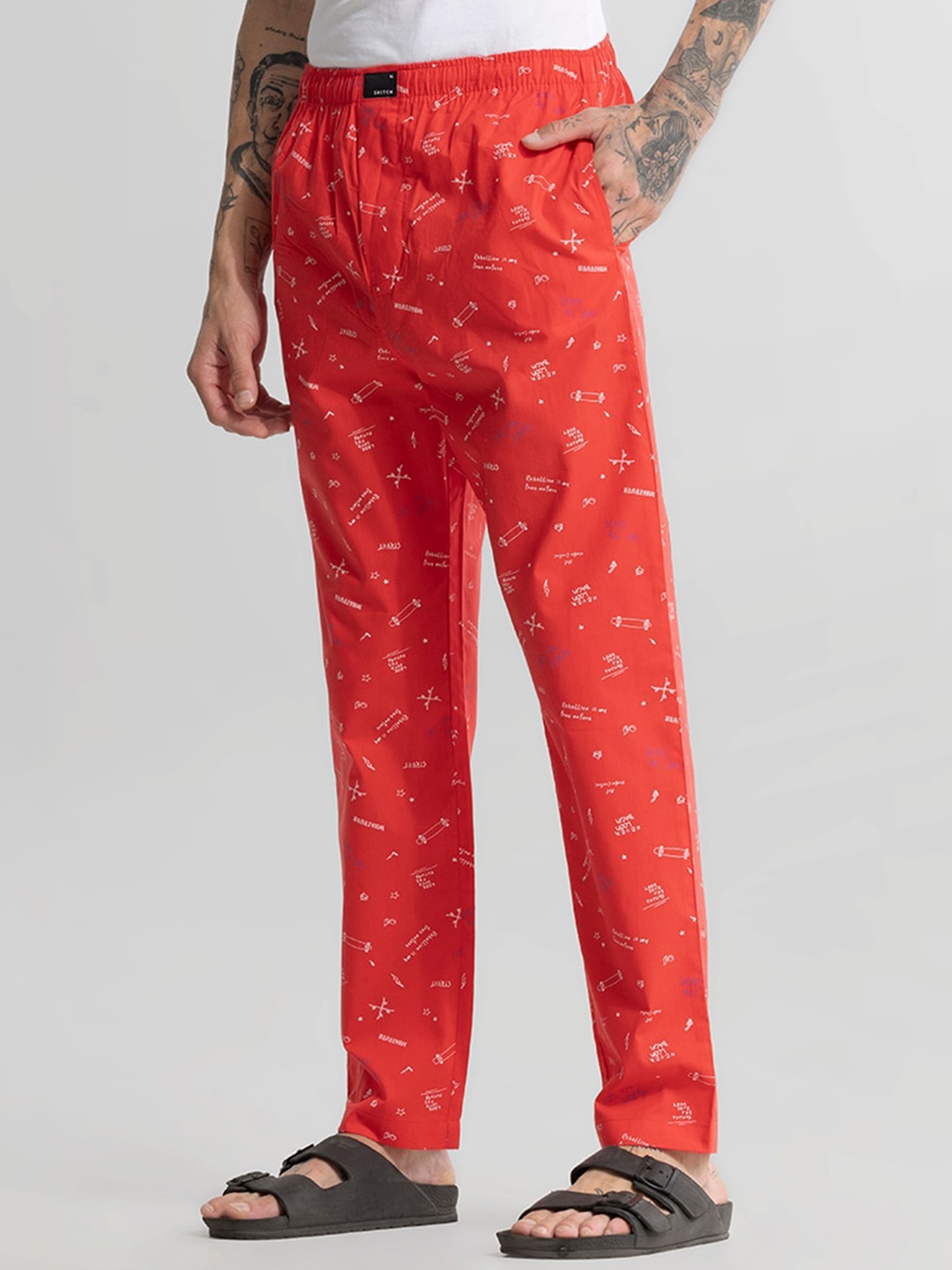 

Snitch Men Printed Tapered Fit Mid Rise Pyjamas, Red