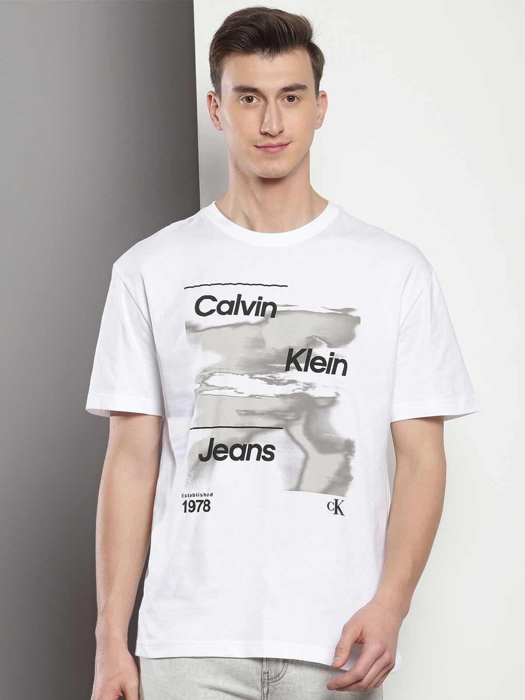 

Calvin Klein Jeans Relaxed Fit Typography Printed Round Neck Cotton Casual T-shirt, White