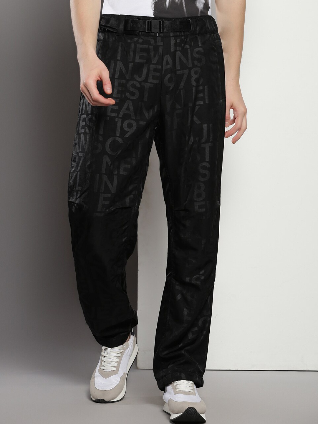 

Calvin Klein Jeans Men Typography Printed Straight Fit Trousers, Black