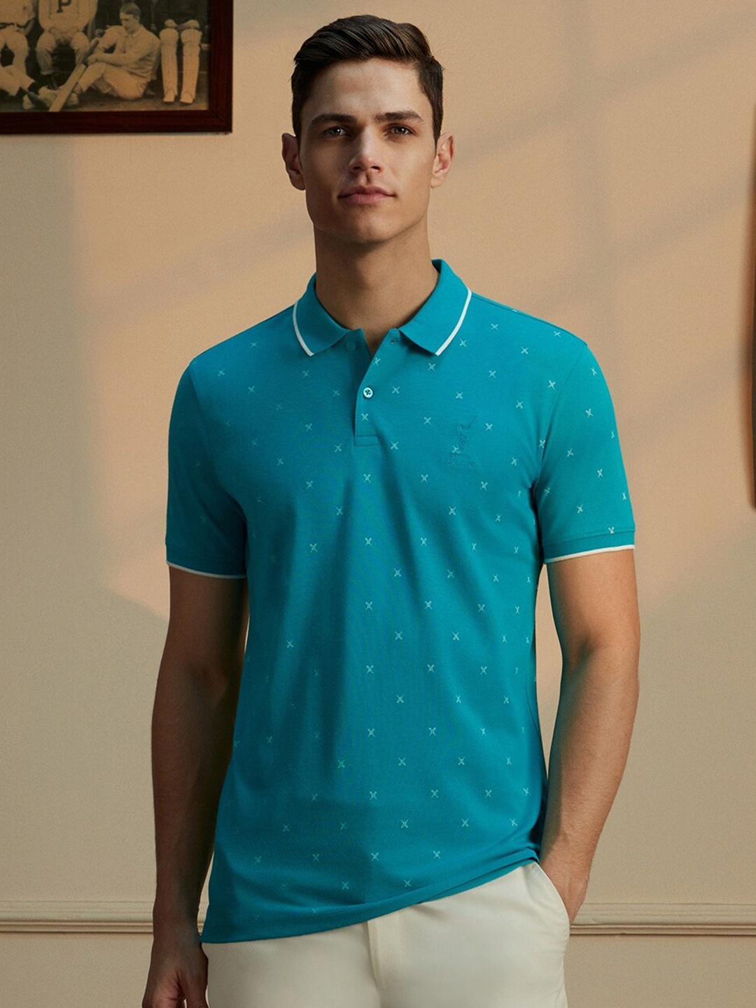 

Peter England Casuals Geometric Printed Polo Collar Slim Fit T-shirt, Blue