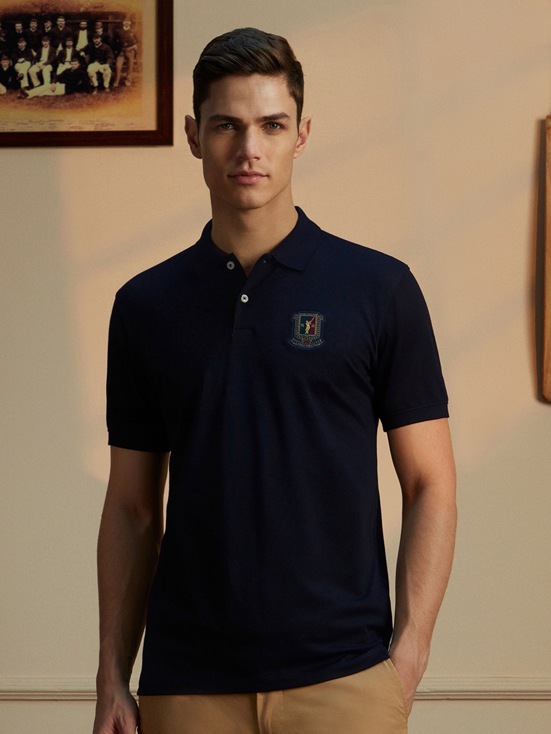 

Peter England CasualsMen slim fit cricket inspired Polo T-shirt, Navy blue