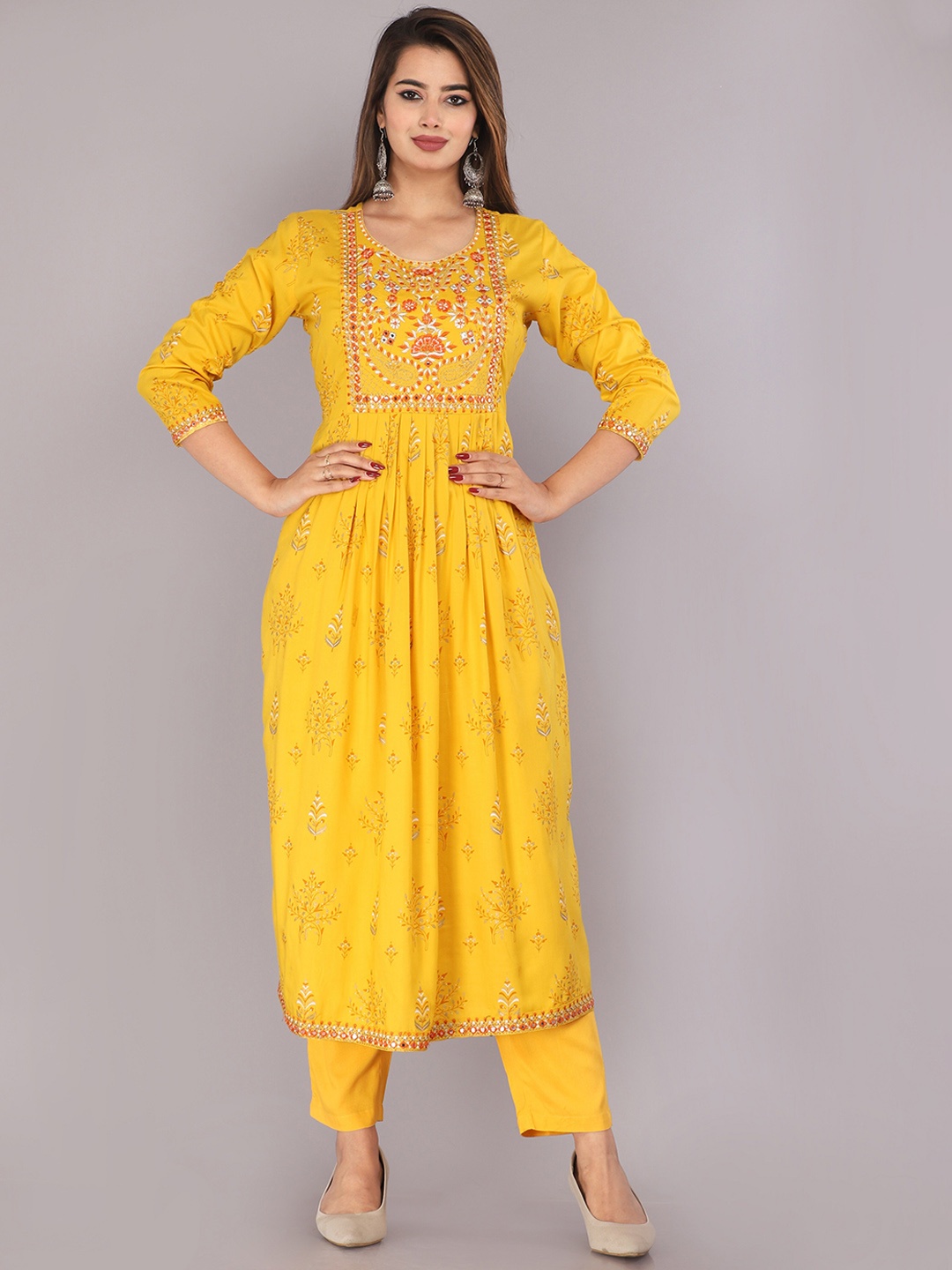 

MARISY Floral Prnted Empire Thread Work Kurta with Trousers, Yellow