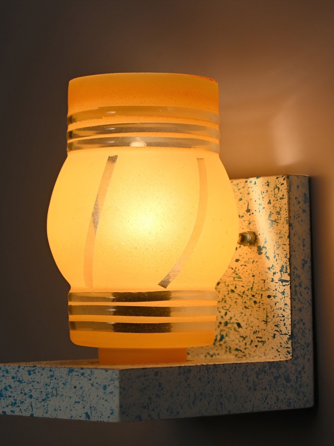 

Afast Orange Textured Glass Cylindrical Wall Lamp