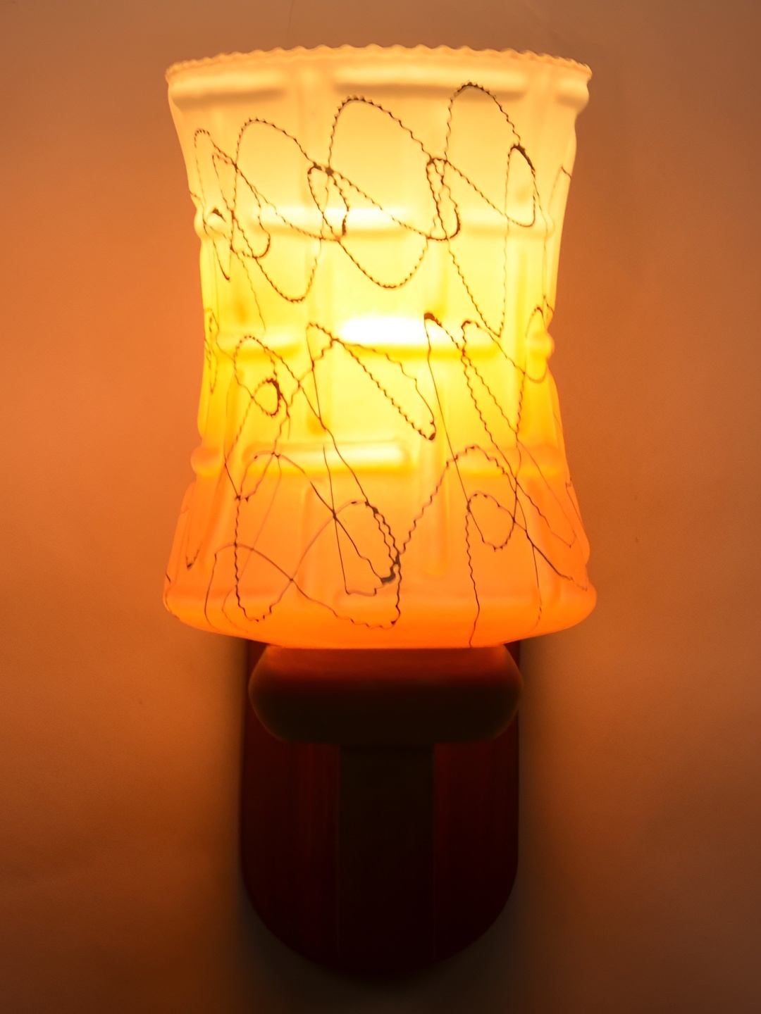 

Afast Orange Textured Glass Cylindrical Wall Lamp