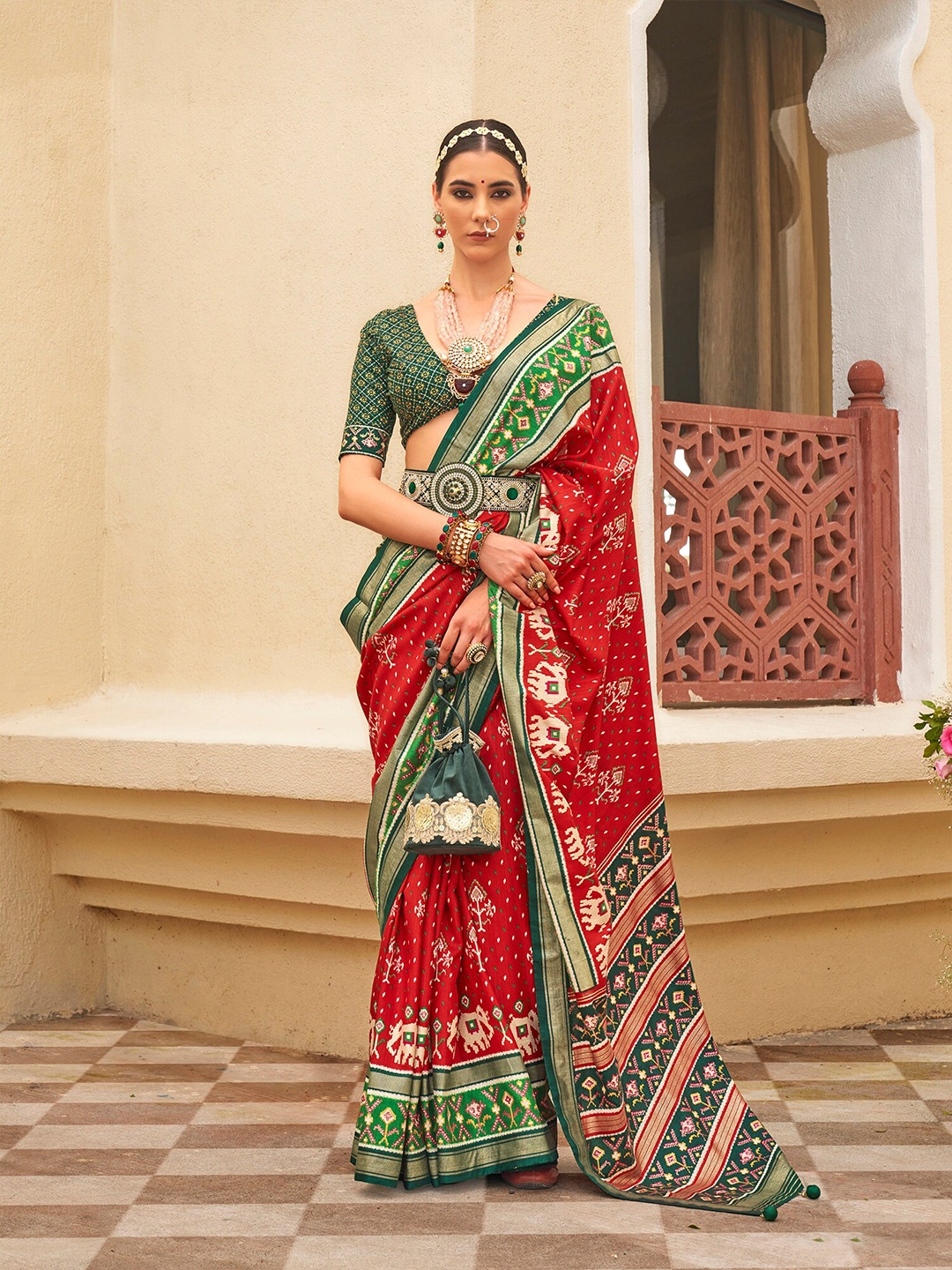 

elora Ethnic Motifs Woven Design Zari Patola Saree, Red
