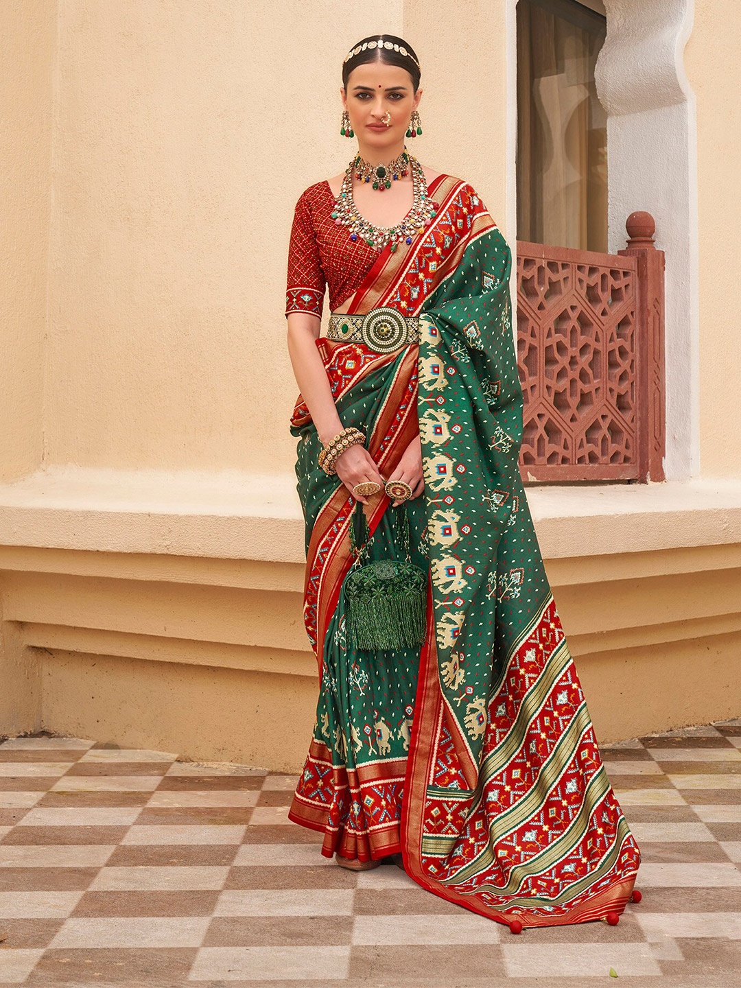 

elora Ethnic Motifs Printed Zari Patola Saree, Green