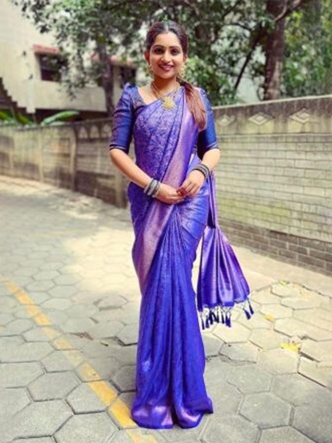 

Visit Wear Violet and GoldToned Art Silk Kanjeevaram Saree