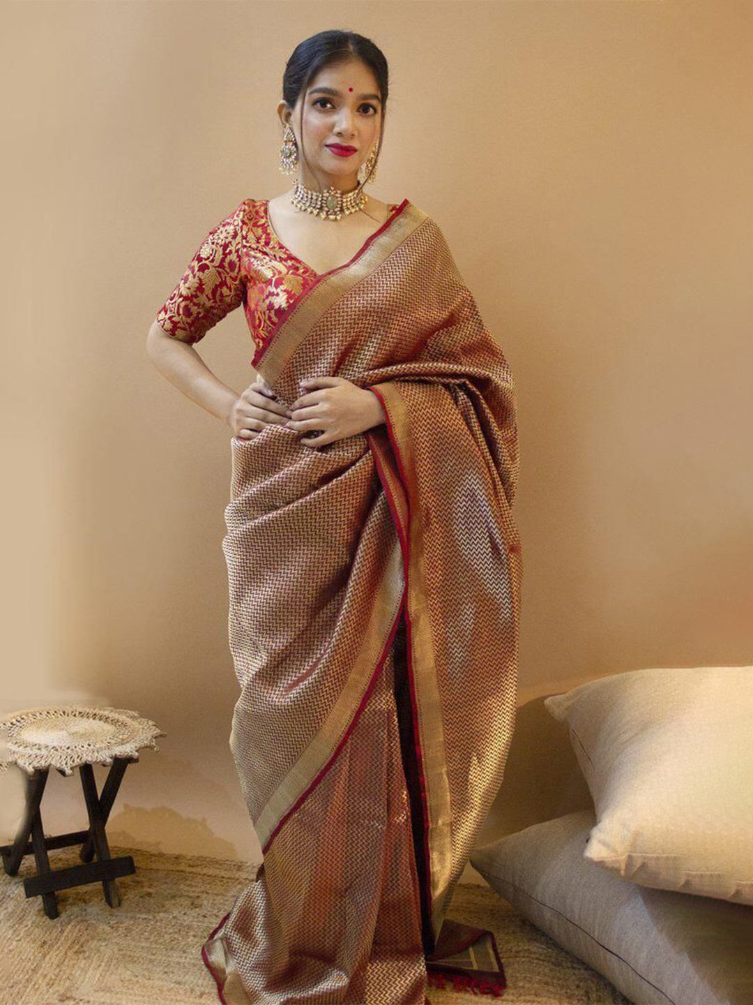 

Visit Wear Maroon and GoldToned Art Silk Banarasi Saree