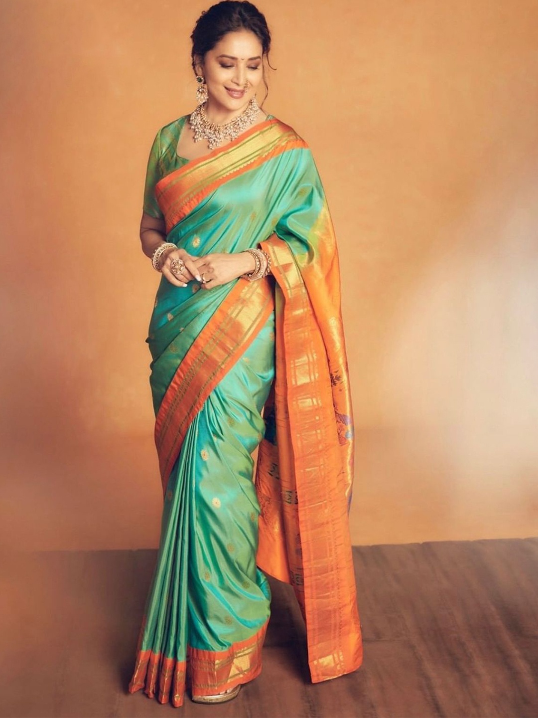 

Visit Wear Ethnic Motifs Woven Design Kanjeevaram Saree, Sea green