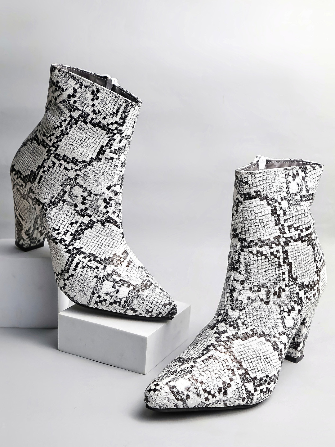 

Brauch Women Mid Top Animal Printed Pointed Toe Block Heel Regular Boots, Black