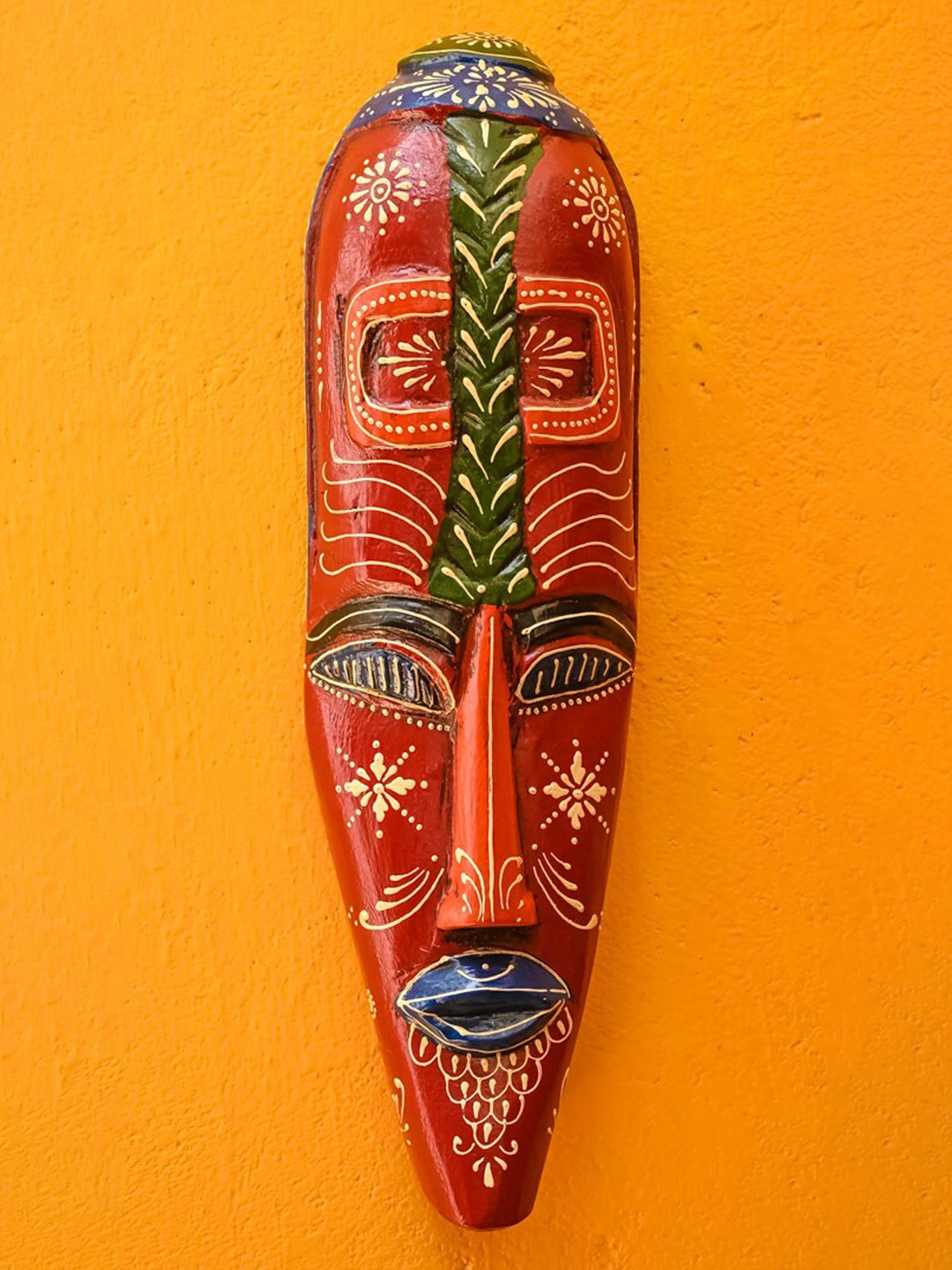 

Indune Lifestyle Red & Green Wooden Mask Tribal Figurine Showpiece