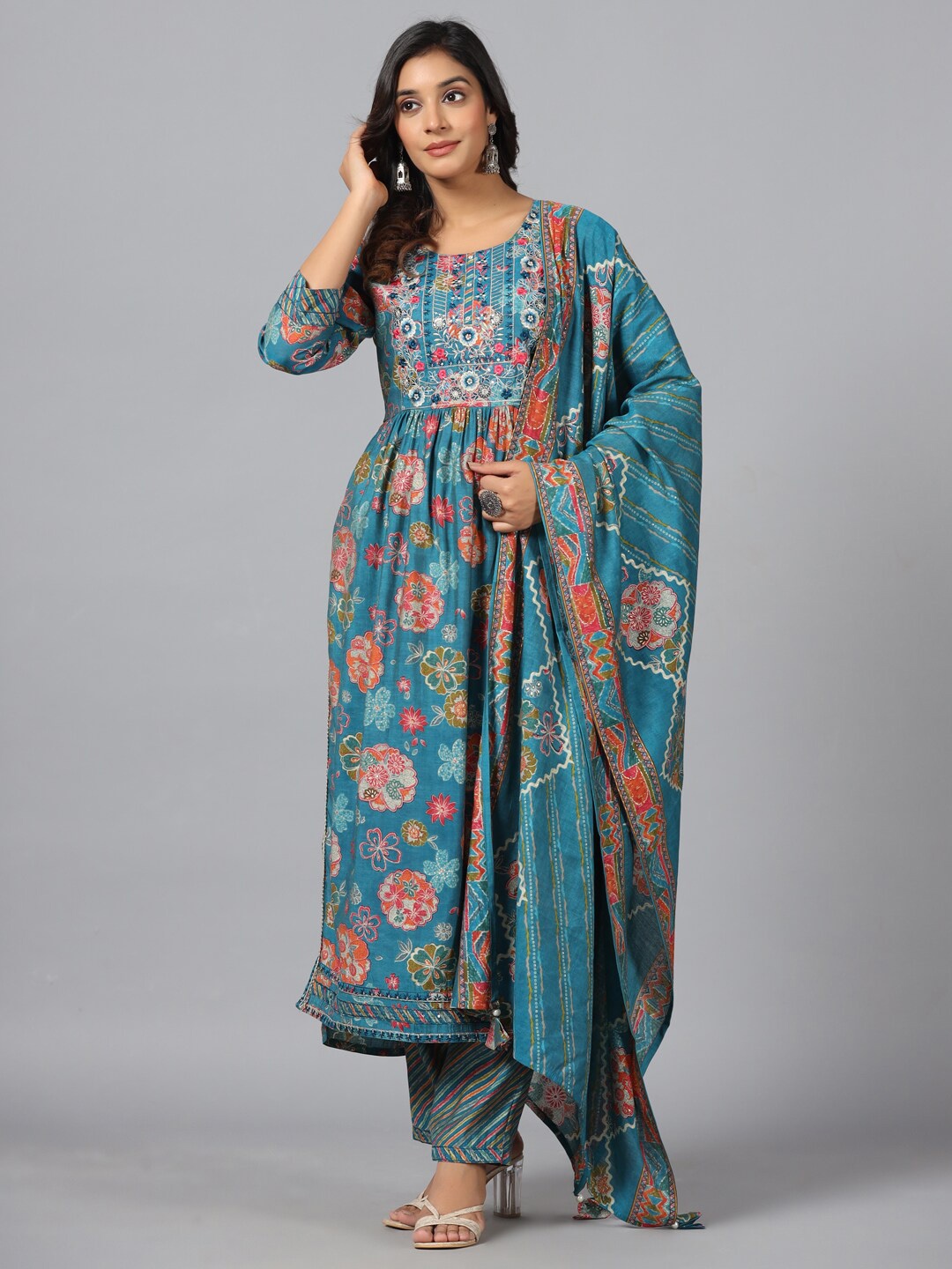 

Amchoor Floral Printed Thread Work Empire Kurta With Trousers & Dupatta, Teal