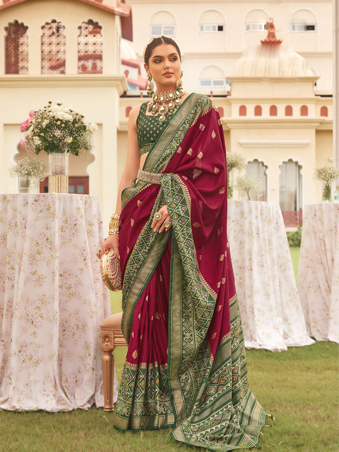 

Mitera Ethnic Motifs Woven Design Zari Patola Saree, Maroon