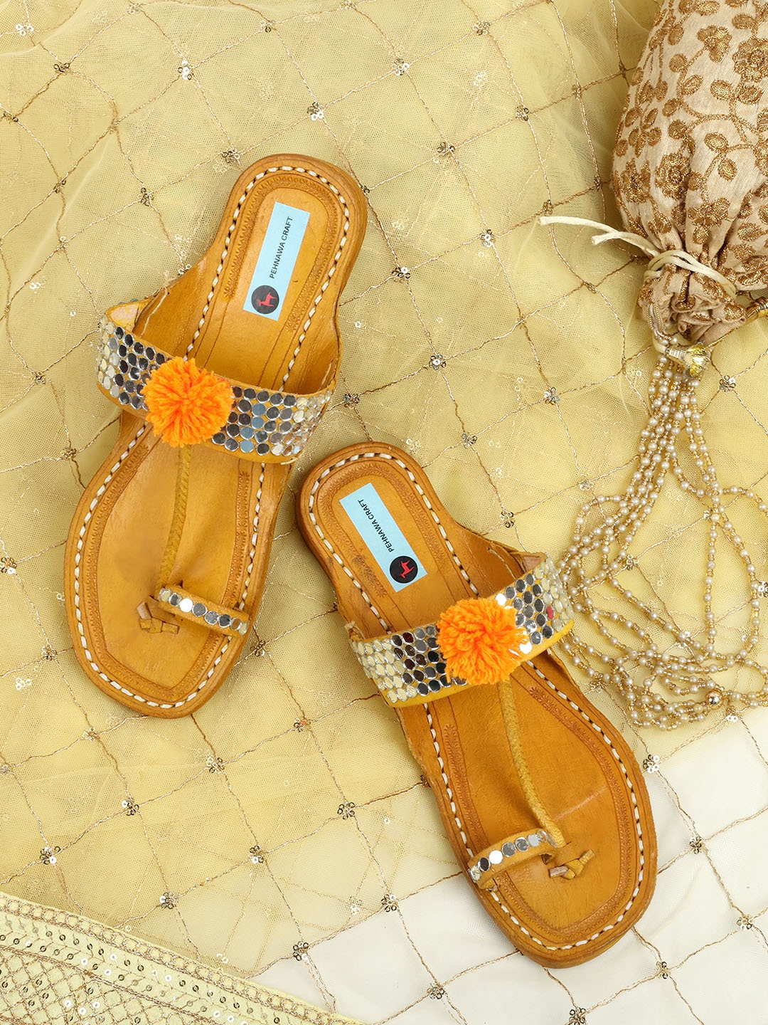 

PehnawaCraft Ethnic Embellished Leather Pompom One Toe Flats, Orange