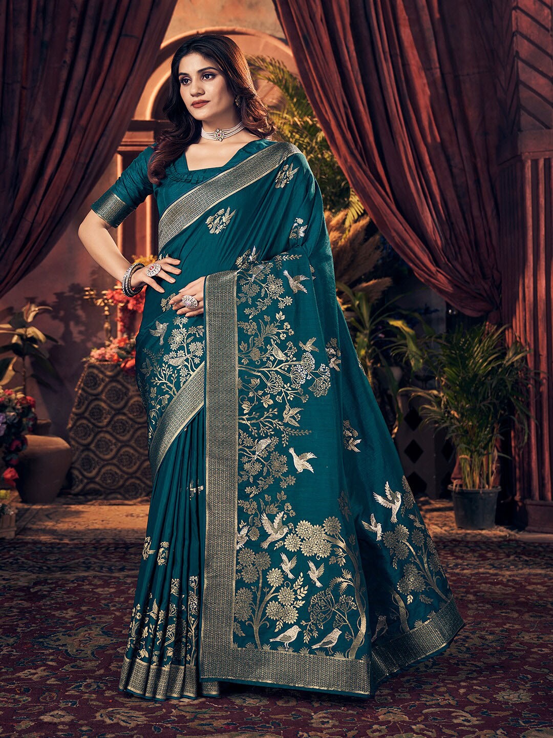 

Kalapushpi Turquoise Blue Silk Blend Banarasi Saree