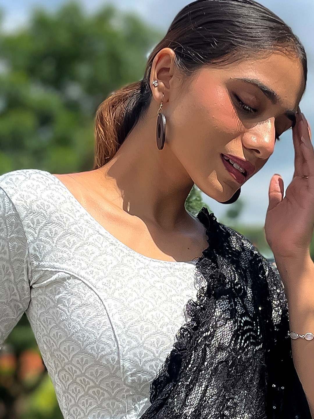 

Bindigasm's Advi Off-White Zari Embroidered Banarasi Stretchable Readymade Saree Blouse, Silver