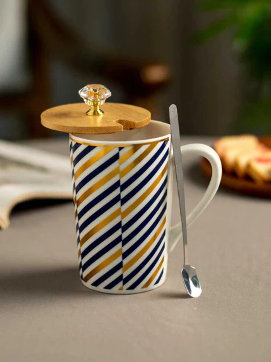 

THEDECORKART Yellow & Blue Striped Ceramic Glossy Mug 300 ML