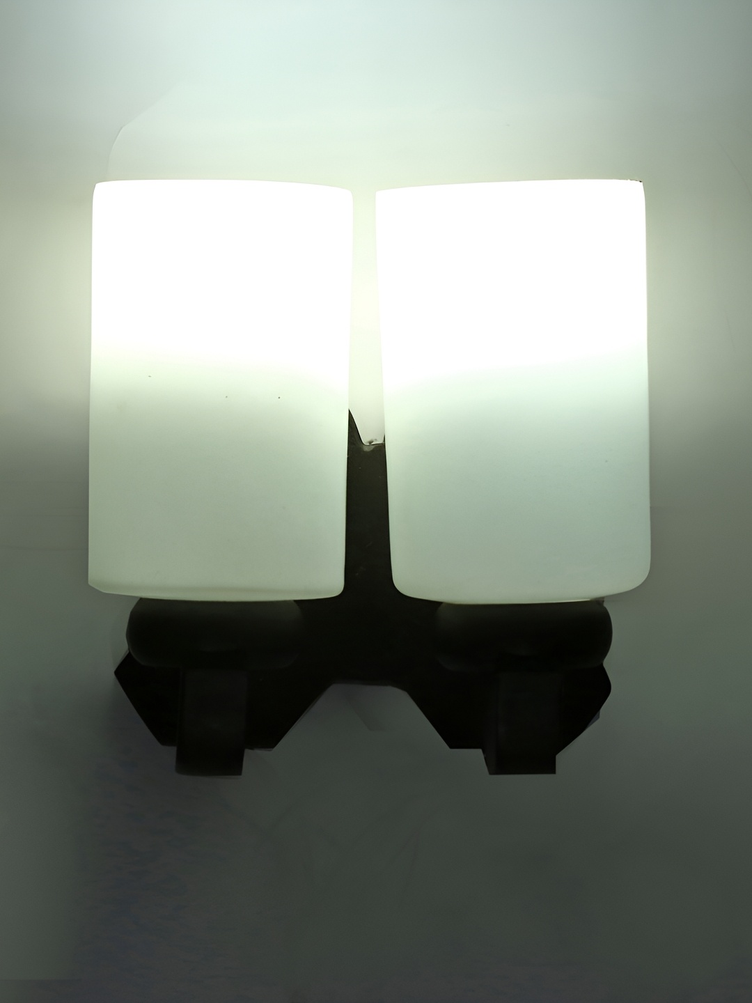 

Afast White & Black Cylindrical Shaped Glass Wall Lamp