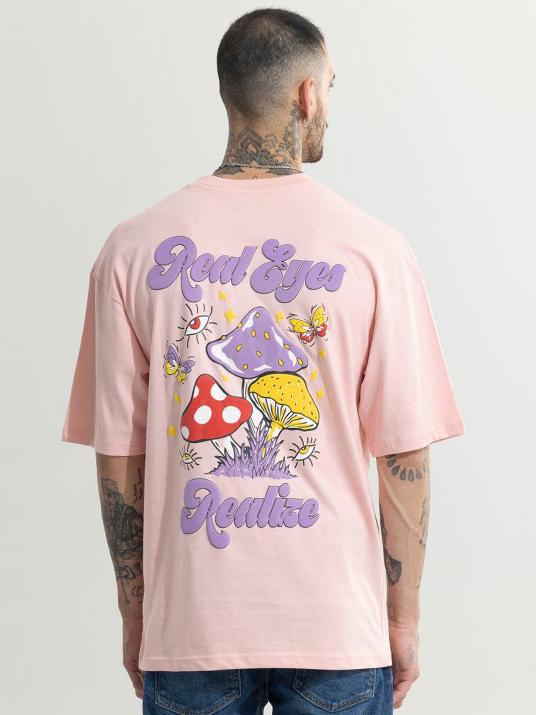 

Snitch Peach-Coloured Graphic Printed Drop-Shoulder Sleeves Oversized T-shirt