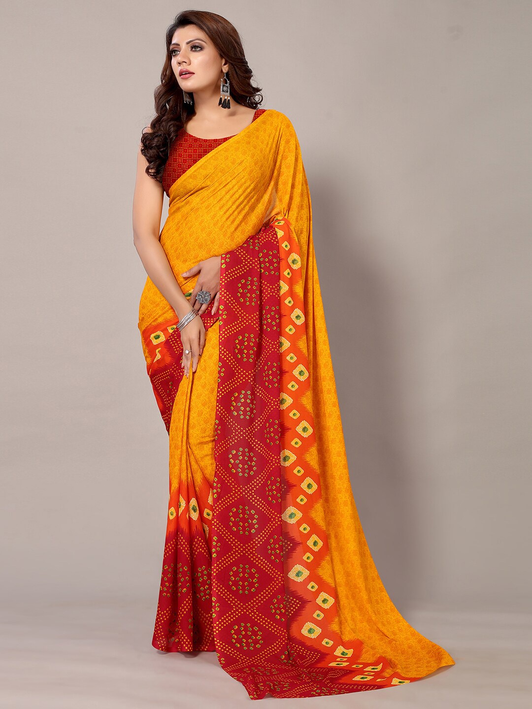 

KALINI Bandhani Printed Pure Georgette Saree, Mustard