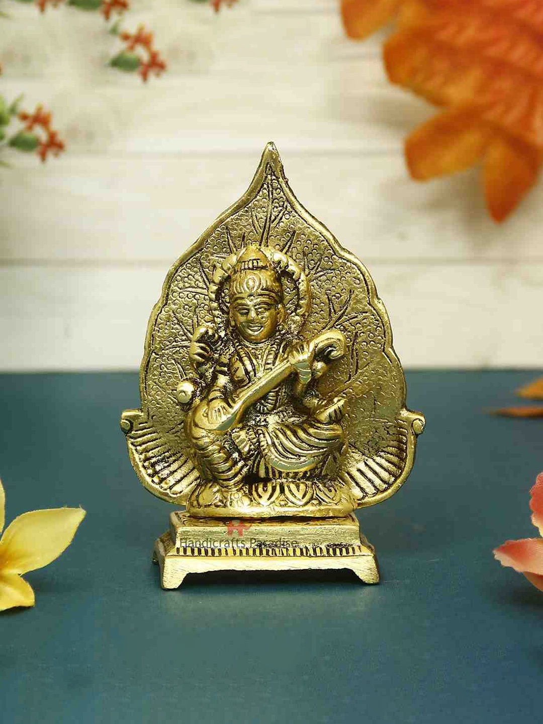 

HANDICRAFTS PARADISE Gold-Toned Saraswati ji Metal Showpiece