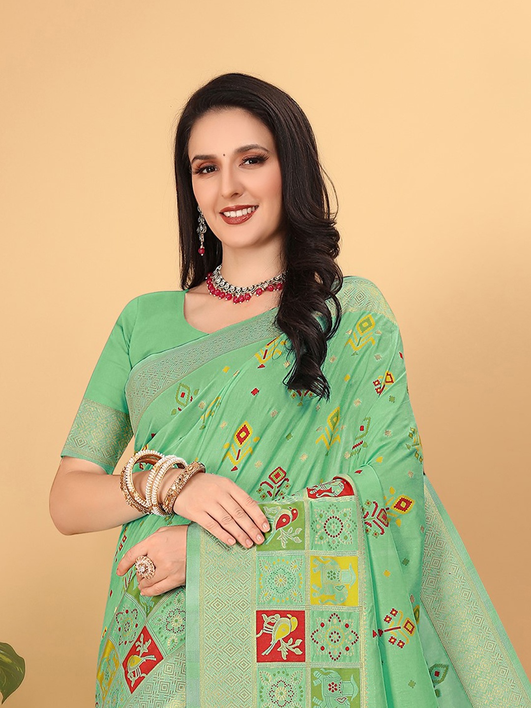 

Pionex Ethnic Motifs Woven Design Zari Pure Silk Patola Saree, Green